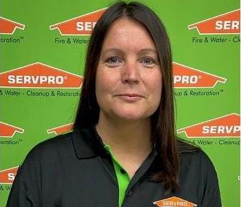 Human Resources Manager, employee in front of SERVPRO logo