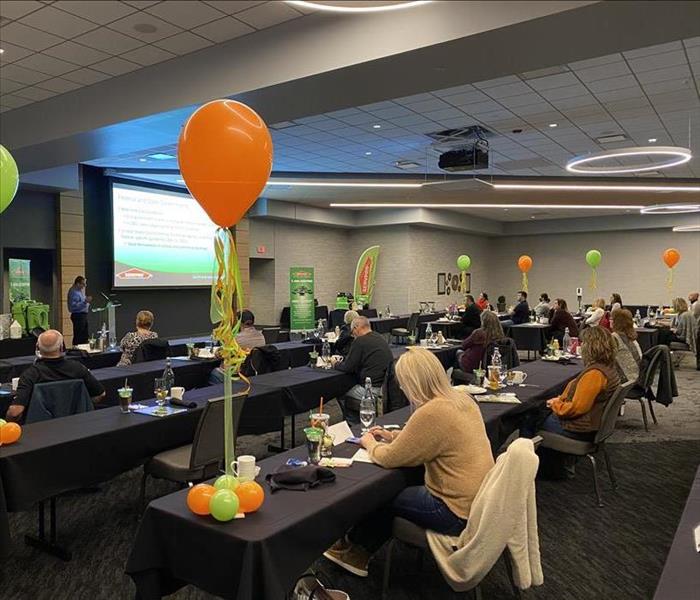 image of a room full of real estate agents taking a continuing education course offered by SERVPRO